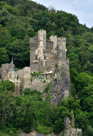 Rhine Valley; Germany- August 11 2021: Rheinstein burg in the valley of medieval castlesのeditorial素材