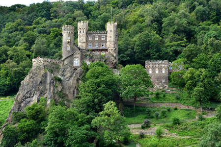 Rhine Valley; Germany- August 11 2021: Rheinstein burg in the valley of medieval castlesのeditorial素材