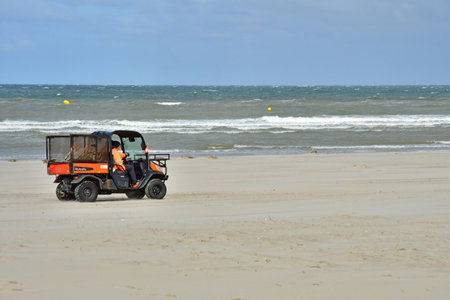 Le Touquet Paris Plage; France - April 20 2024: electric car for cleaning the beachのeditorial素材
