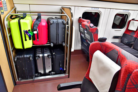 Kyoto; Japan - August 10 2024: suitcases in a trainのeditorial素材