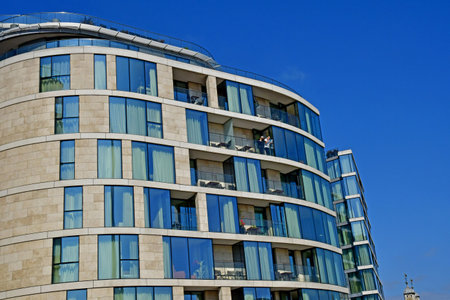 London; England - May 28 2023: apartment block in front of the London bankのeditorial素材