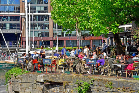 London; England - May 28 2023: restaurant on the marinaのeditorial素材