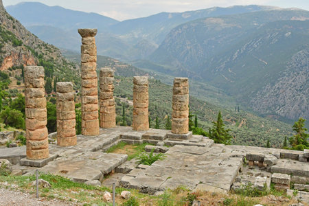Delphi; Greece - August 31 2022: the Appolo Temple in the archaeological siteのeditorial素材