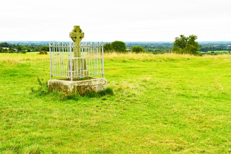 Skryne, Ireland - September 15 2022: the High Cross on the top of the Hill of Tara archeological siteのeditorial素材
