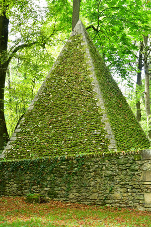 Chambourcy; France - August 26 2023: the pyramid ice house in the picturesque Desert de Retz created in the 18th centuryのeditorial素材