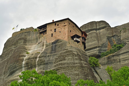 Kalambaka; Greece - August 31 2022: the holy monastery of Saint Nikolaos of Anapafsas in the Meteora
