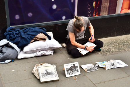 Bath; England - May 30 2024: artist in the picturesque city centerのeditorial素材