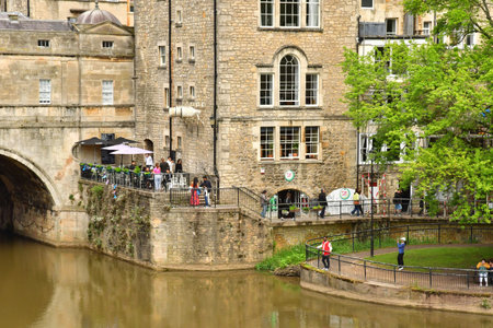 Bath; England - May 30 2024: the Avon river in the picturesque city centerのeditorial素材
