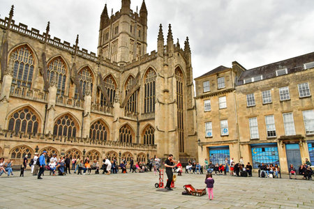 Bath; England - May 30 2024: street artist near the abbeyのeditorial素材