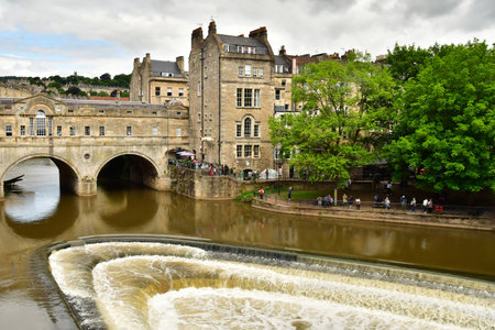 Bath; England - May 30 2024: the Avon river in the picturesque city centerのeditorial素材