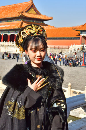 Beijingi; China - November 6 2024: woman in the Forbidden Cityのeditorial素材