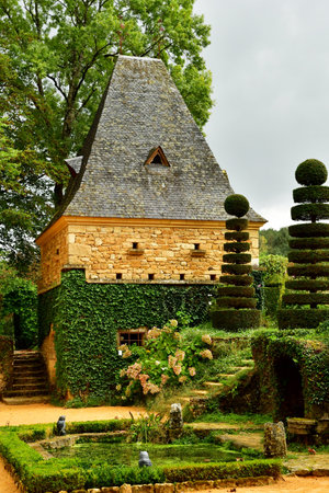 Salignac Eyvigues; France - October 7 2023: the picturesque Eyrignac manor gardensのeditorial素材