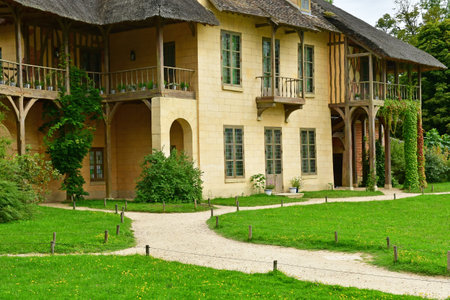 Versailles; France - August 19 2023: Queen s House in the park in the Marie Antoinette estateのeditorial素材