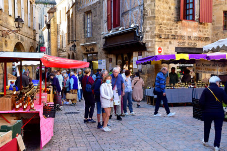 Sarlat la Caneda; France - October 7 2023: the picturesque Saturday marketのeditorial素材