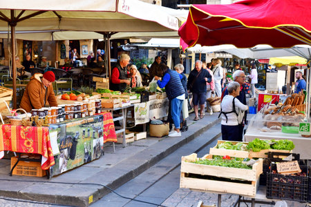 Sarlat la Caneda; France - October 7 2023: the picturesque Saturday marketのeditorial素材
