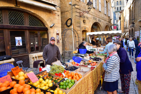 Sarlat la Caneda; France - October 7 2023: the picturesque Saturday marketのeditorial素材