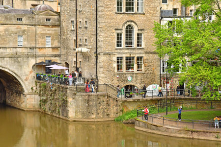 Bath; England - May 30 2024: the Avon river in the picturesque city centerのeditorial素材