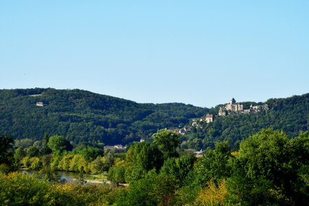 La Roque Gageac; France - October 7 2023: the Castelnaud castle view from La Roque Gageacの写真素材