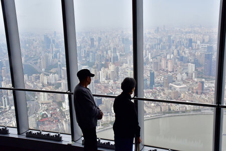 Shanghai; China - November 6 2024: the city seen from the Shanghai Tower in the business district of Lujiazuiのeditorial素材