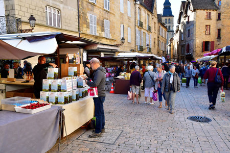Sarlat la Caneda; France - October 7 2023: the picturesque Saturday marketのeditorial素材