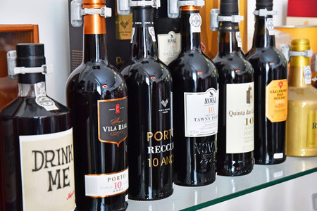 Regua, Portugal - July 10 2022: bottles of Porto wine in the gift shop in the historical Douro museumのeditorial素材