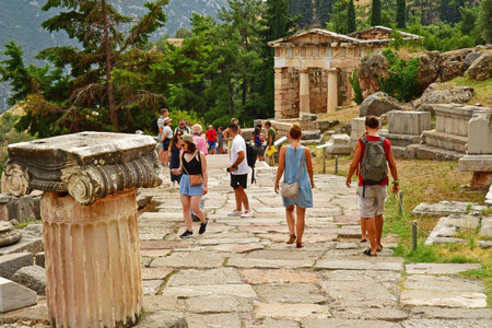 Delphi; Greece - August 31 2022: the Athenian Treasury in the archaeological site
