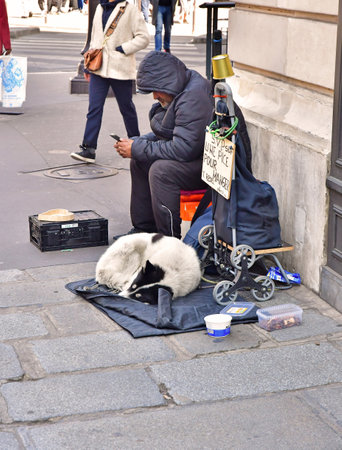 Paris; France - April 10 2025: homeless person in the boulevard des Capucinesのeditorial素材