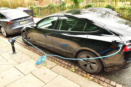 London; England - February 20 2025: an electric car is recharging in the Hampstead district