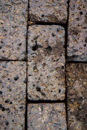 Cobblestone textured walkway closeup image backgroundの写真素材