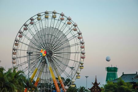The ferris wheel in the amusement park in Thailand.のeditorial素材