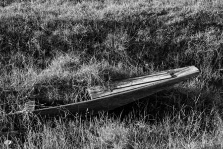 The old boat in the reservoir in the country of Thailand.の写真素材