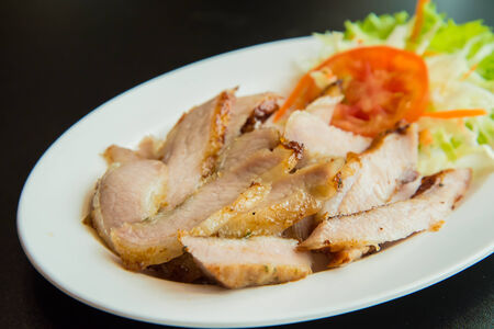 Roasted pork on the table in the restaurant.の写真素材
