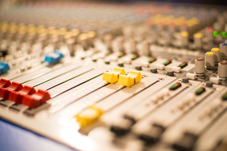 Slider on a sound mixer with blursの写真素材