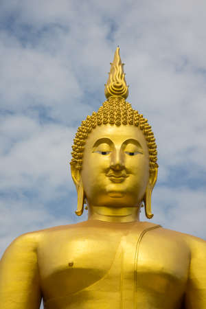 A big Buddha statue in the temple of Thailand.の写真素材