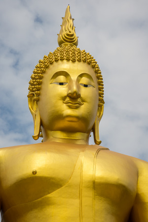 A big Buddha statue in the temple of Thailand.の写真素材