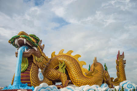 A large dragon statue in the China temple in Thailand.の写真素材