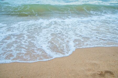 Beaches and sea, Sea waves lapped the sandy beach.の写真素材