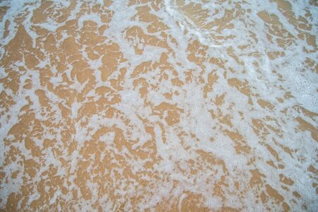 Beaches and sea, Sea waves lapped the sandy beach.