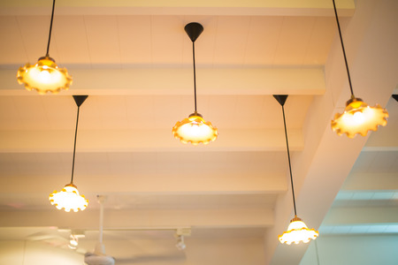 Recessed ceiling lights in a coffee shop
