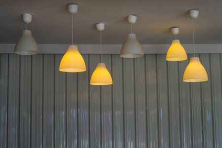 Recessed ceiling lights in a coffee shopの写真素材