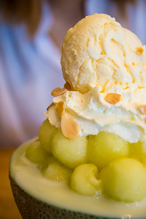 Ice cream in a half of melon balls. Bing suの写真素材