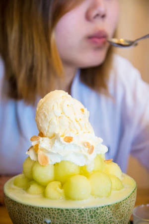 Ice cream in a half of melon balls. Bing suの写真素材