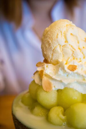 Ice cream in a half of melon balls. Bing suの写真素材