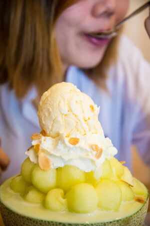 Ice cream in a half of melon balls. Bing suの写真素材