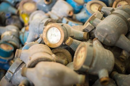 The old water meter is unavailable in the factory.の写真素材