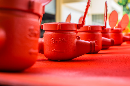 Spraying color many water meter in the factory.の写真素材