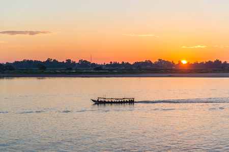 Orange sky and river in the winterの写真素材