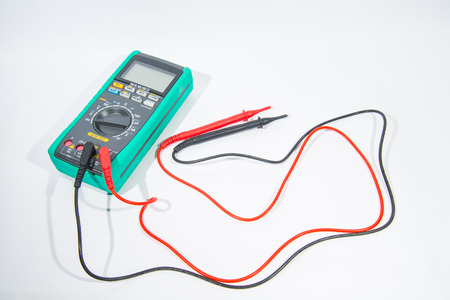 Electric multimeter on white background