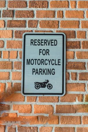 traffic sign on the wall of motorcycle shop.の写真素材