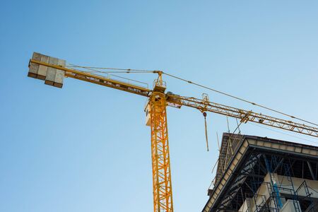 Crane is used in the construction of  buildings.の写真素材